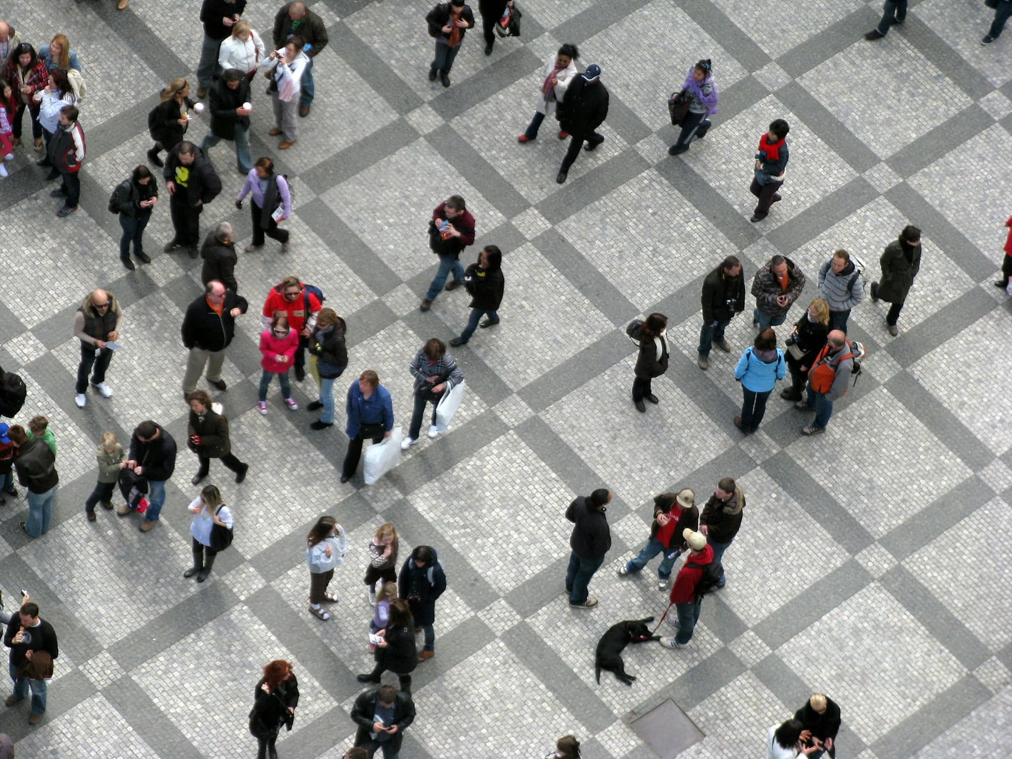 Aerial view of a large crowd of people in a public plaza